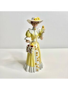 Avon 2012 Mrs Albee Presidents Club Award Porcelain Sunflower Lady Figurine